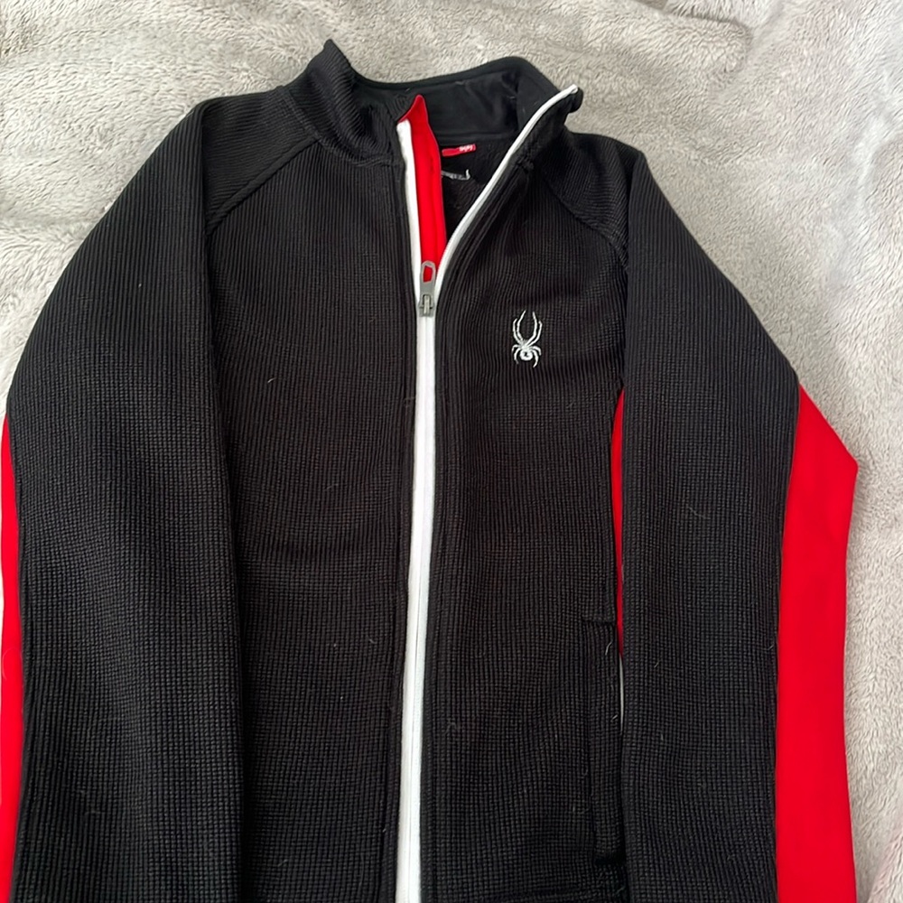Spider zip up jacket.